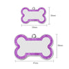 A purple glitter pet ID tag shaped like a bone, measuring 33mm long.