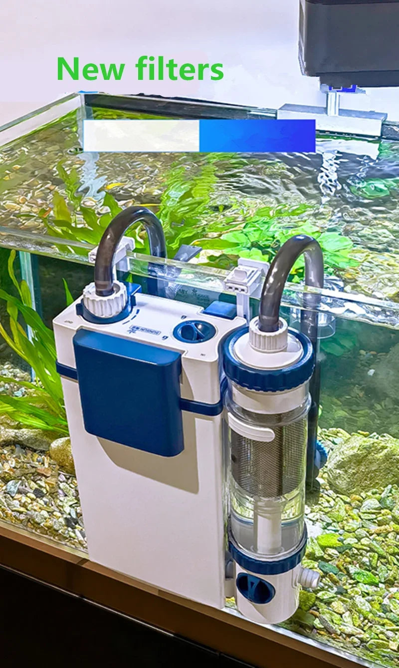A white wall-mounted aquarium filter with blue accents is visible inside a glass tank filled with aquatic plants and stones.