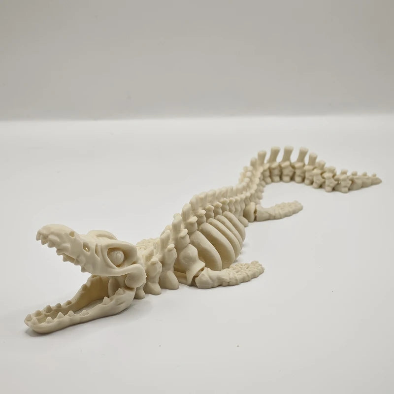 A realistic skeleton aquarium decoration sculpted in the design of a dinosaur skull.