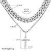A dainty diamond Cuban link necklace set featuring a chain and a cross pendant.