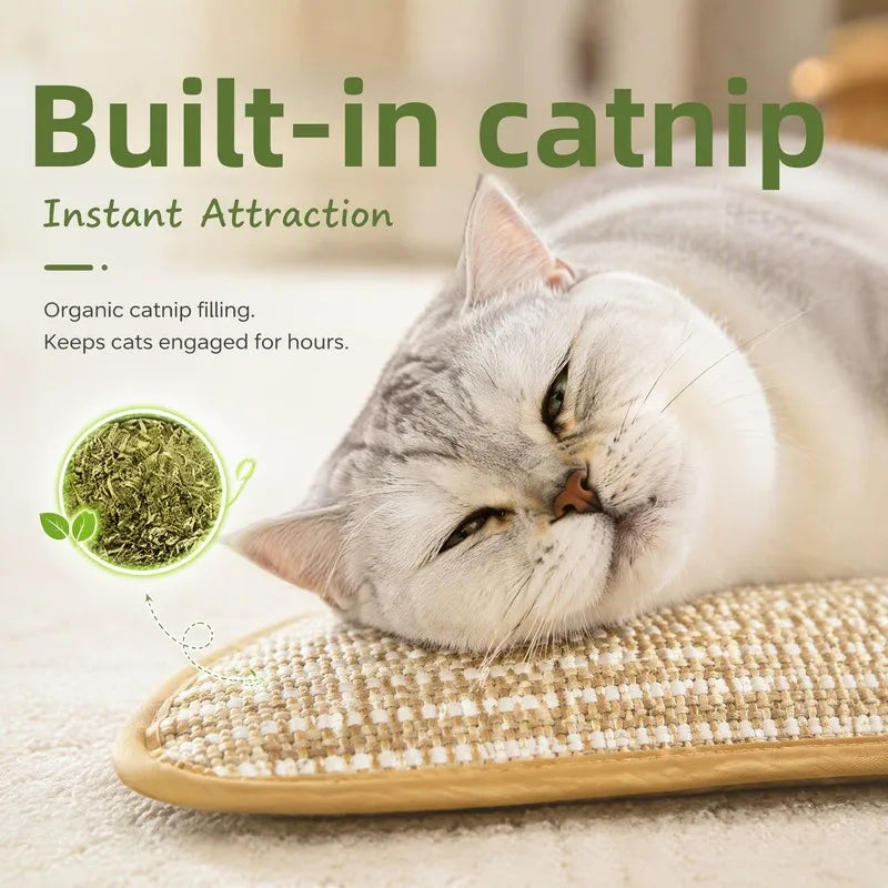 A white cat is relaxing on a beige jute scratching pad, with green catnip visible nearby.