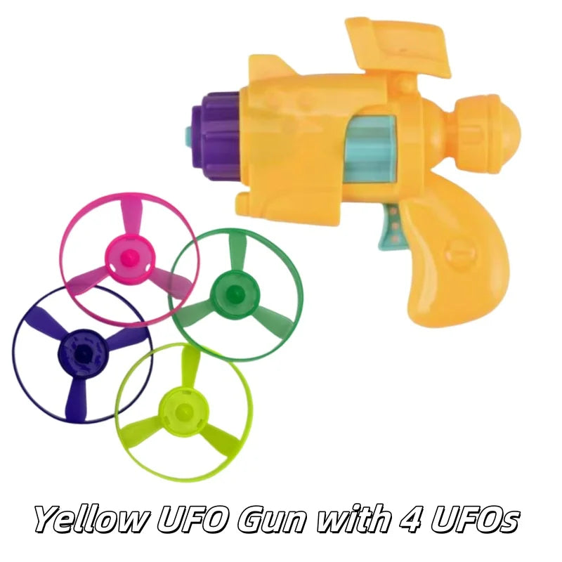 Yellow UFO gun toy with four replacement UFO discs