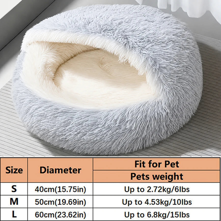 A gray plush pet bed nest with a white lining shown on a wooden surface.