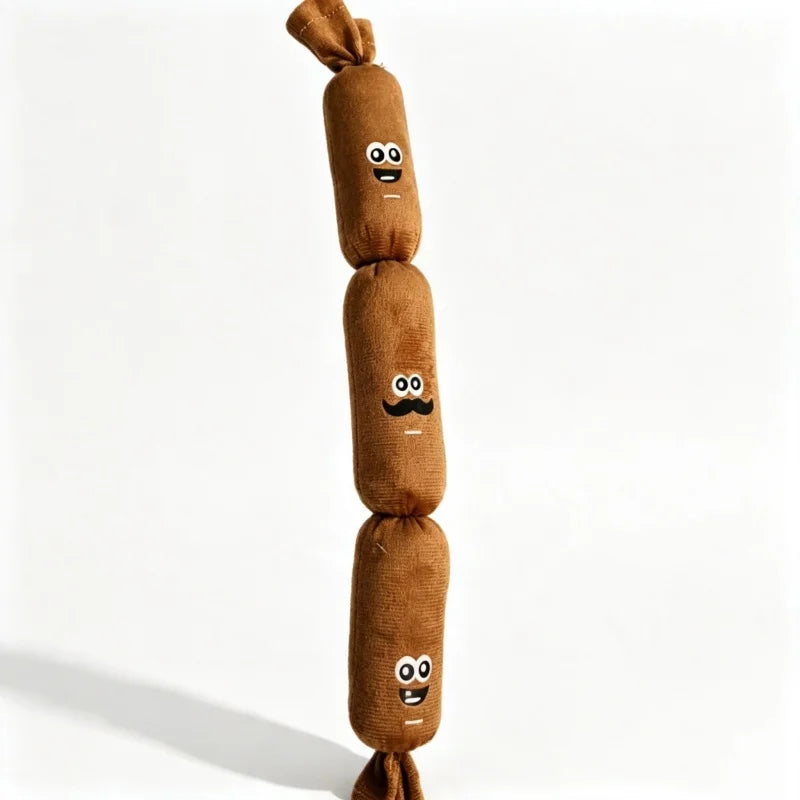 A vertical string of brown sausage-shaped plush toys with smiling faces.