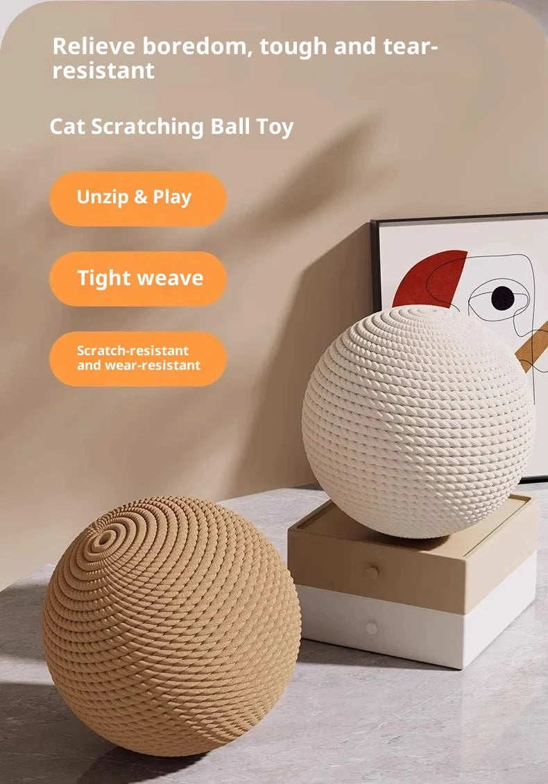 A round, textured natural sisal cat scratching ball toy in beige sits on a wooden box.