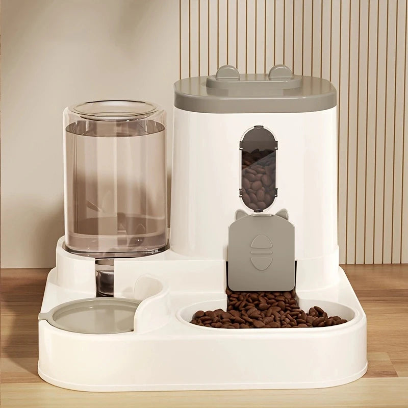 A white gravity-fed pet feeder and water dispenser combo unit with a clear water tank and dry food compartment.