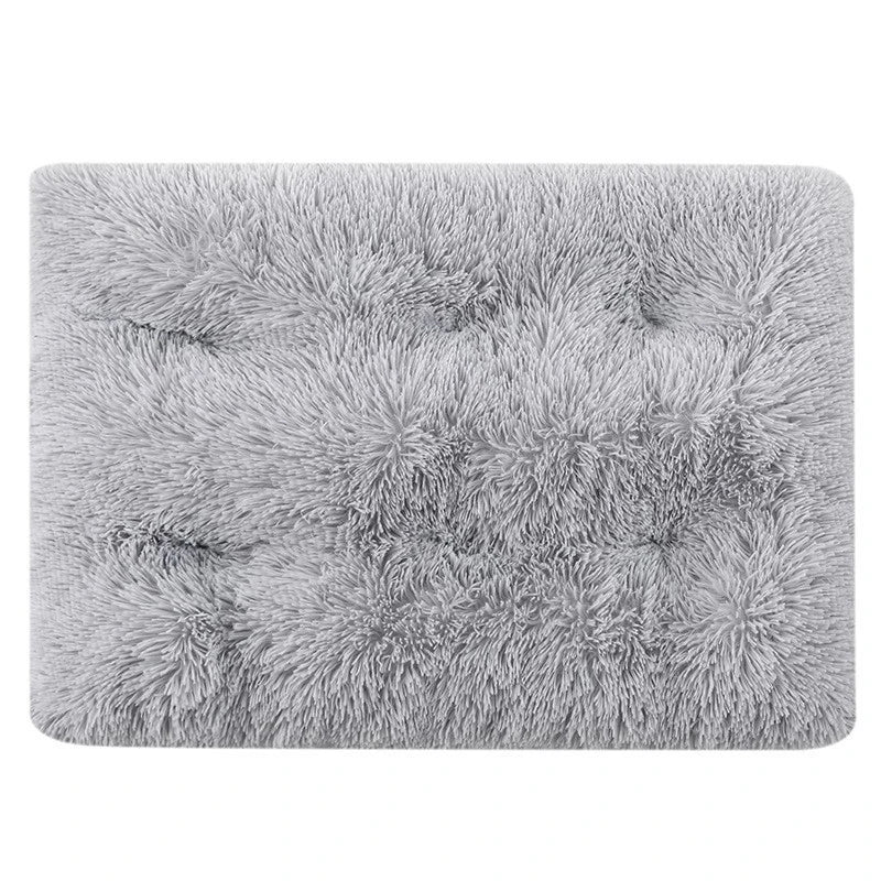 A square, gray plush pet bed mat with a textured, fluffy surface.