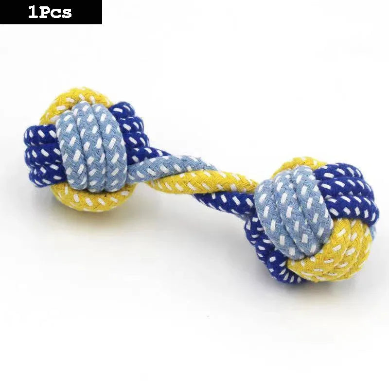 A set of yellow and blue cotton rope dog toys shaped like a carrot and dumbbell.