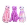 Three plush octopus toys in pink and purple colors for cats and dogs