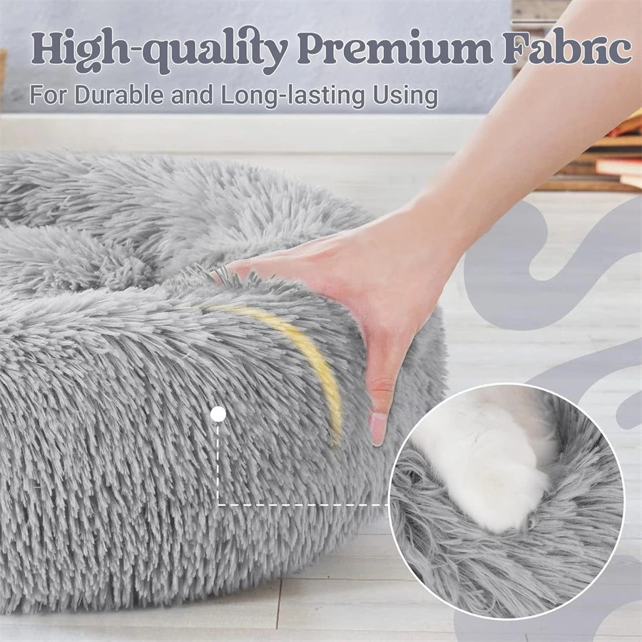 Close-up of a gray plush pet bed fabric showing the texture and durability for dogs and cats