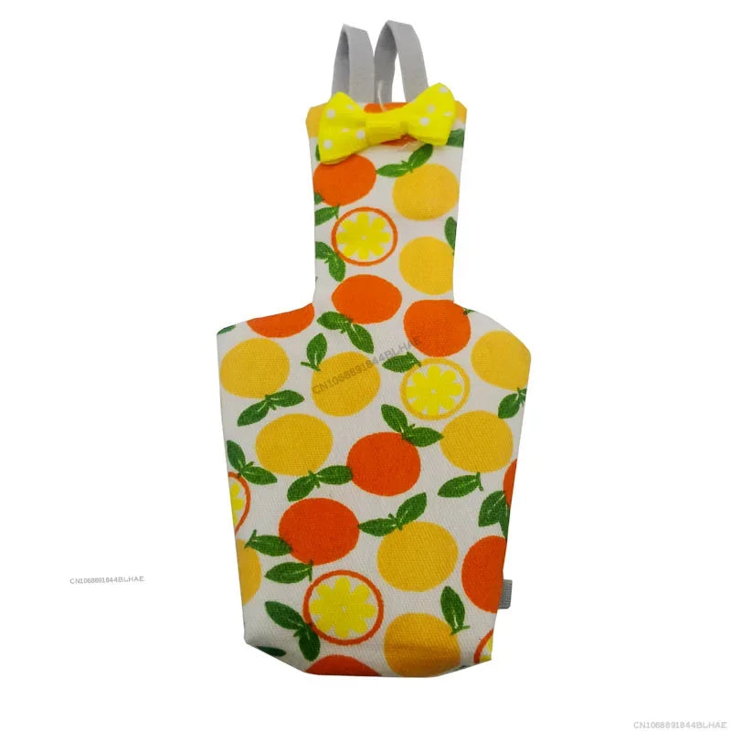 A yellow parrot flight suit with a yellow bow tie and a pattern of green leaves.