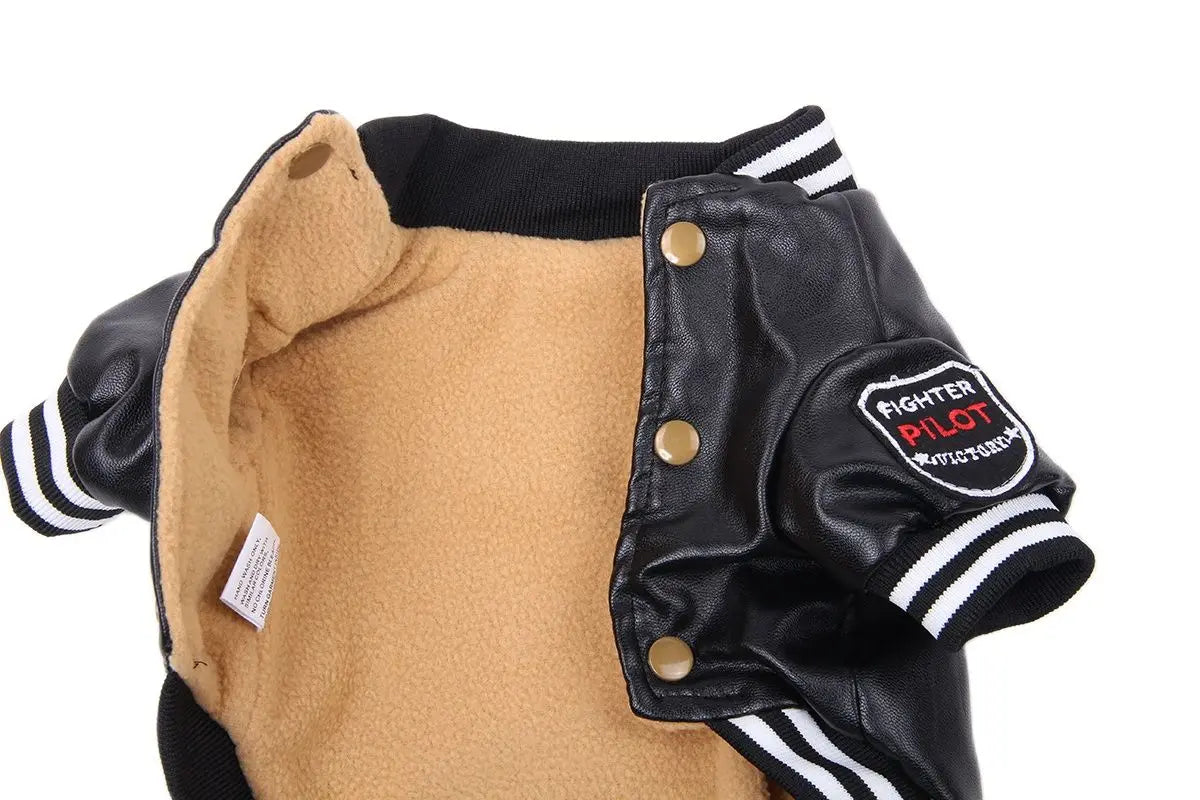Black faux leather dog coat with tan fleece lining and white stripes