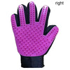 A bright pink silicone pet grooming glove for gentle de-shedding, shown from the palm side.