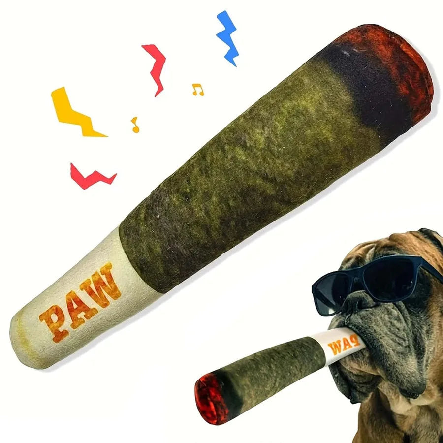 A plush dog toy shaped like a cigar, featuring paw print text and colorful lightning bolt accents.