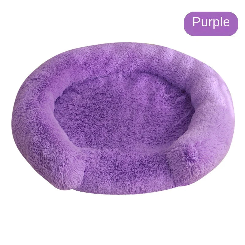 A round, purple, ultra-soft dog bed with a fluffy texture.