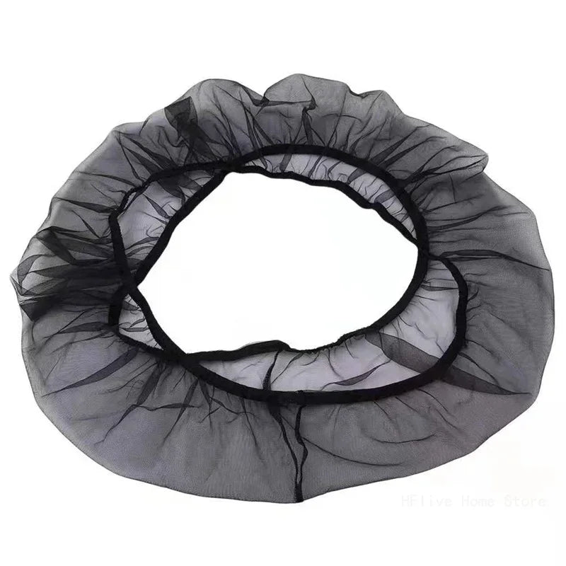 A circular, sheer mesh cover designed for a bird cage.