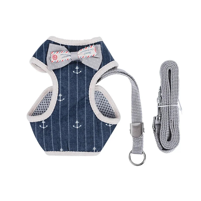 A navy blue mesh vest with a bow tie and matching leash set for a cat.