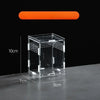 A clear acrylic reptile terrarium box with a bright orange light bar, shown on a dark surface.