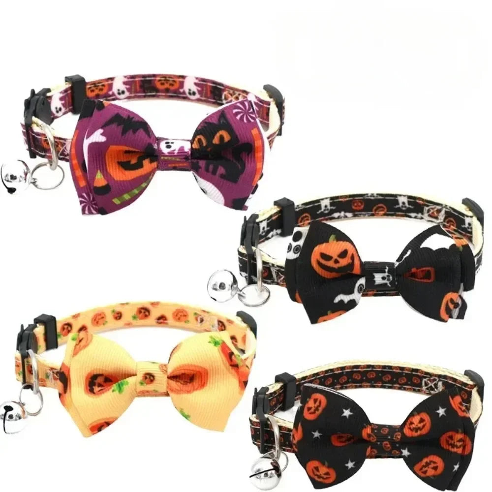 Halloween cat collar with a bow tie and bell featuring orange, purple, and black patterns.