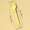 A yellow squeeze spoon feeder for liquid cat treats shown with dimensions.