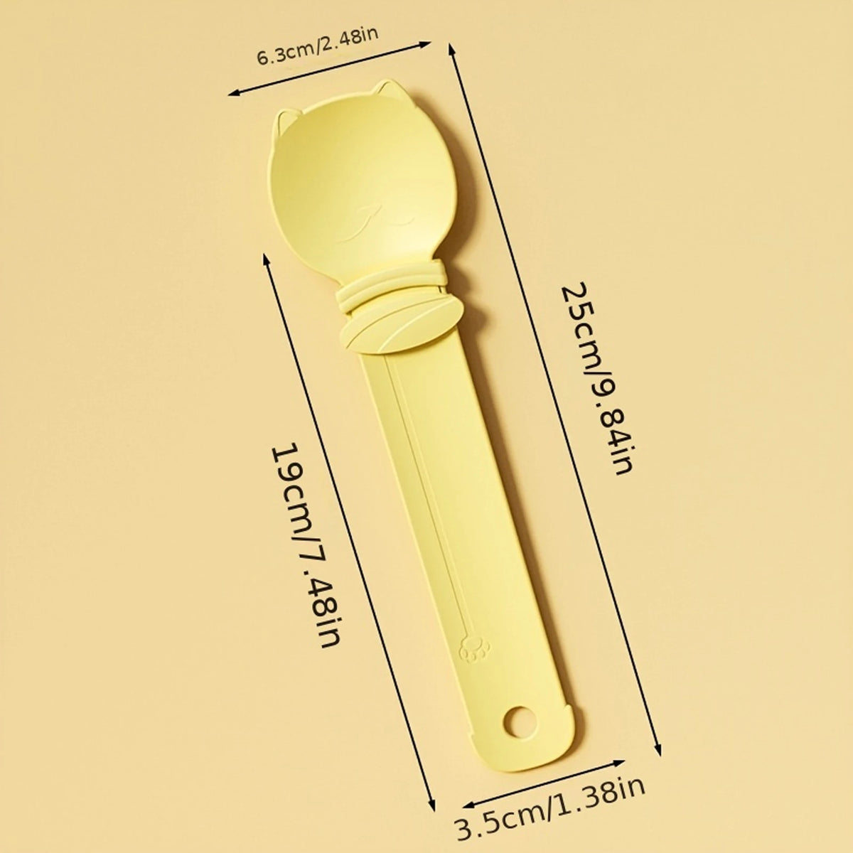 A yellow squeeze spoon feeder for liquid cat treats shown with dimensions.