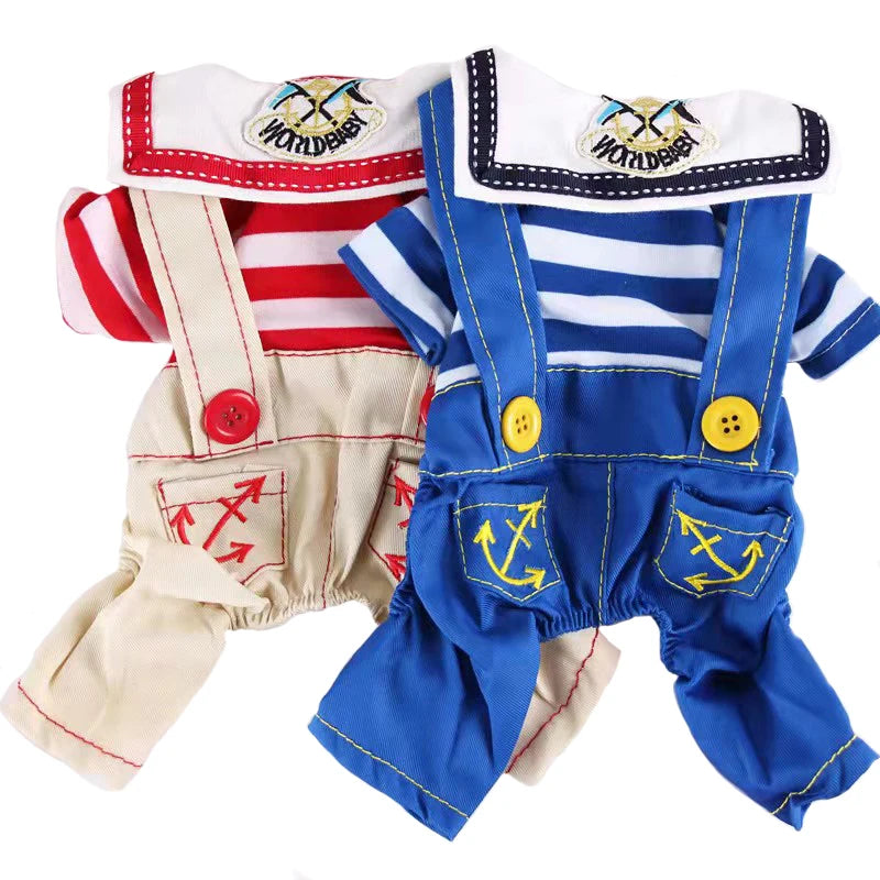 A blue and white seaman dog Halloween costume jumpsuit with a red trim and a white collar.
