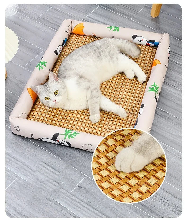 A white cat is relaxing on a summer cooling rattan pet bed with a breathable cotton mat decorated with animal patterns.