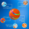 An orange pet ball with blue LED lights, showing its USB rechargeable feature and TPU exterior shell.