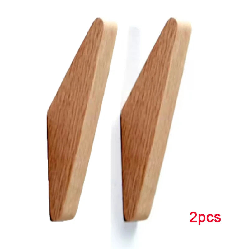 Two wooden triangle coat racks made of oak wood for wall mounting