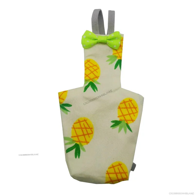 A light yellow parrot flight suit with a green bow tie and yellow fruit patterns.