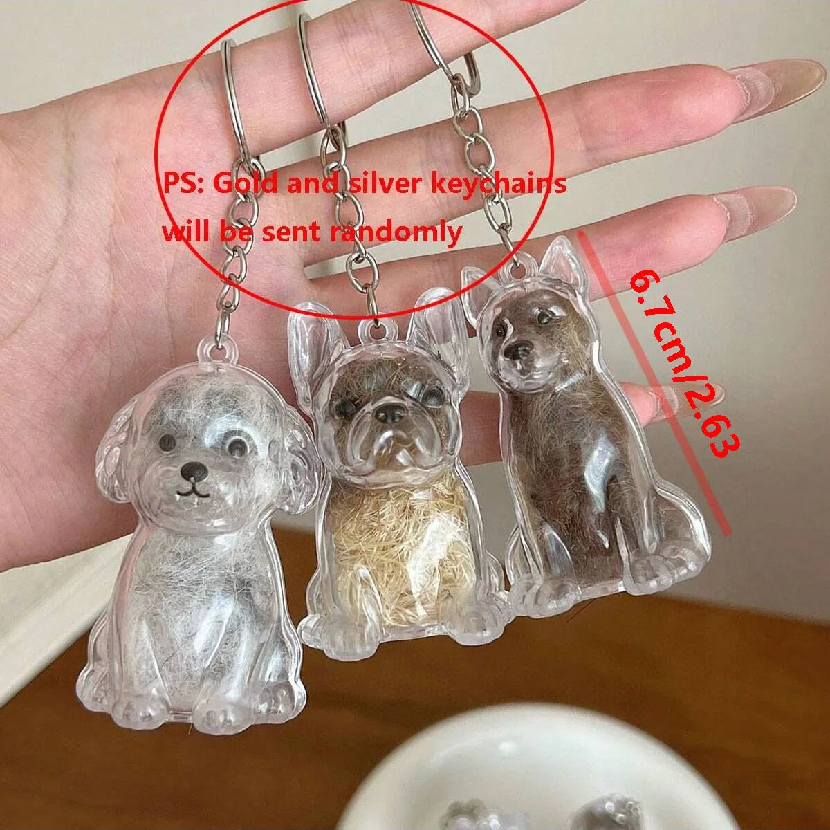 Clear resin dog keychain featuring three different breeds of dogs