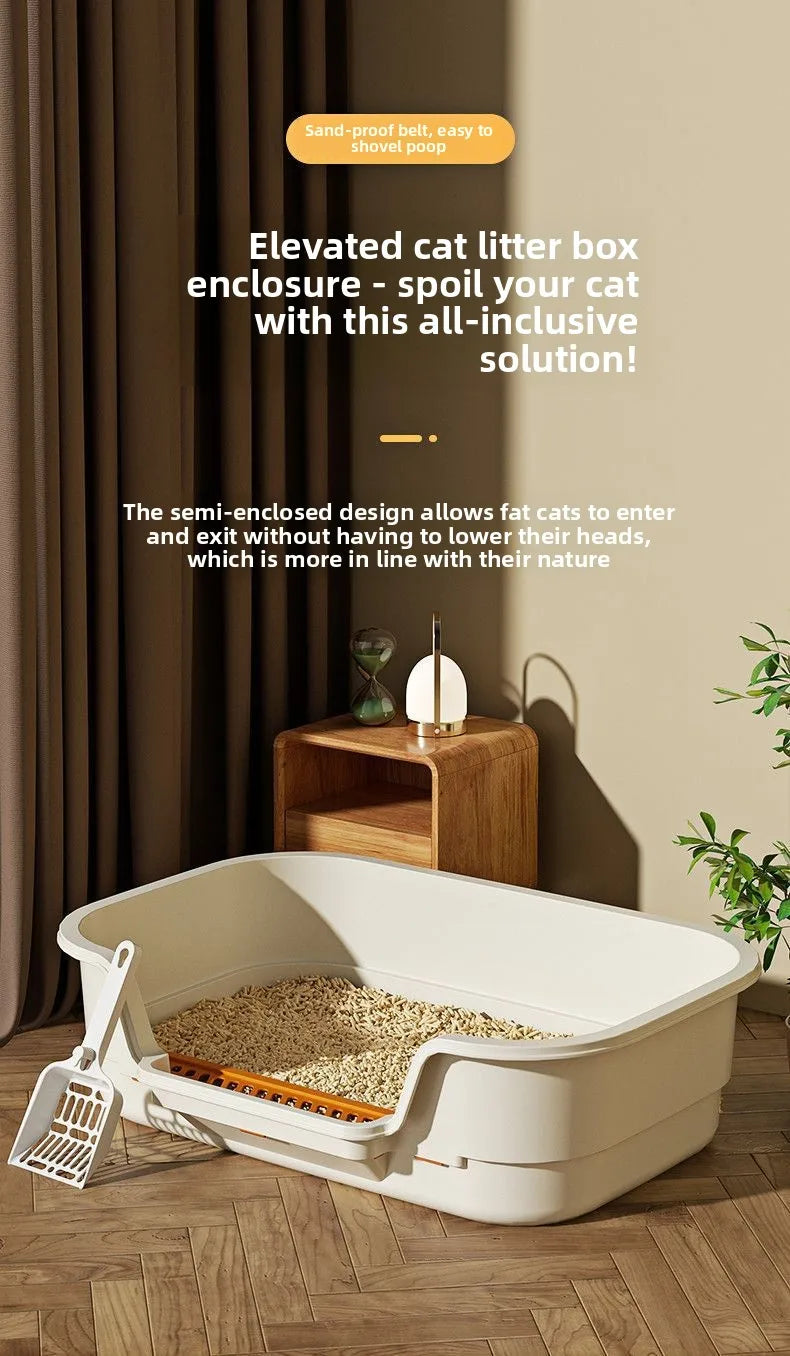A white semi-enclosed cat litter box is shown on a wooden surface with a small wooden shelf and potted greenery in the backgr