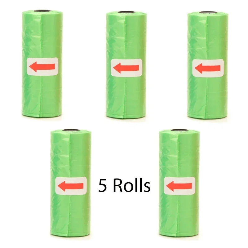 Five rolls of green reusable pet poop bag dispensers with red arrows on the label