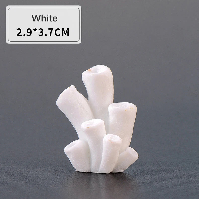 White resin coral aquarium decoration with a textured, natural appearance.