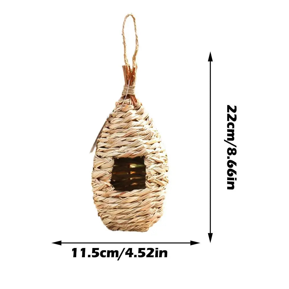 Handwoven straw bird nest for parrots with a woven texture and small opening