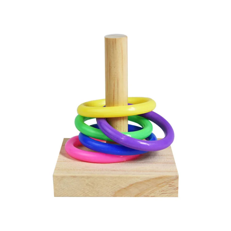 A wooden bird puzzle toy featuring a vertical wooden rod and colorful stacking rings.