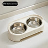 A white-stainless steel elevated feeder stand with two stainless steel bowls for pets.