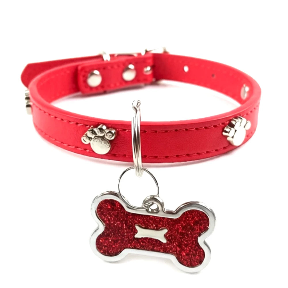 Red leather collar with a bone-shaped tag featuring a sparkly red paw print.