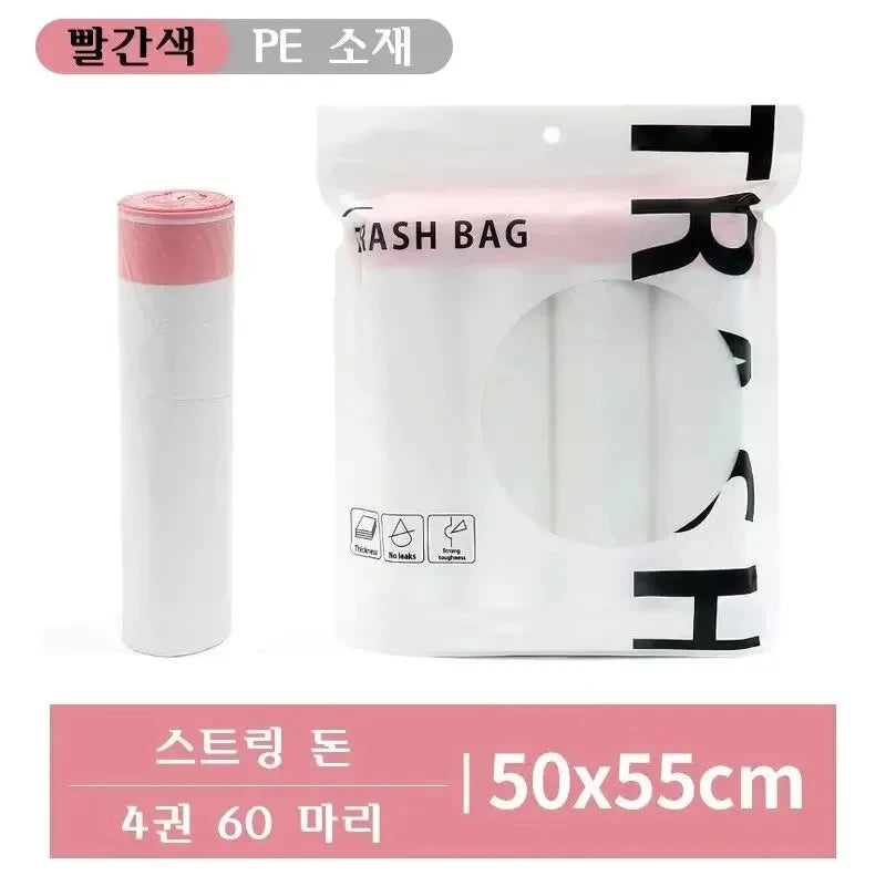White PE trash bags with pink handles and black printing, shown next to a roll of string cord.