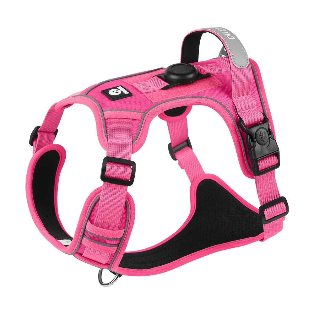 A bright pink reflective no-pull dog harness with a tracker pocket shown against a white background.