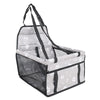 A gray pet travel booster seat with a safety belt for dogs and cats, featuring a mesh enclosure.