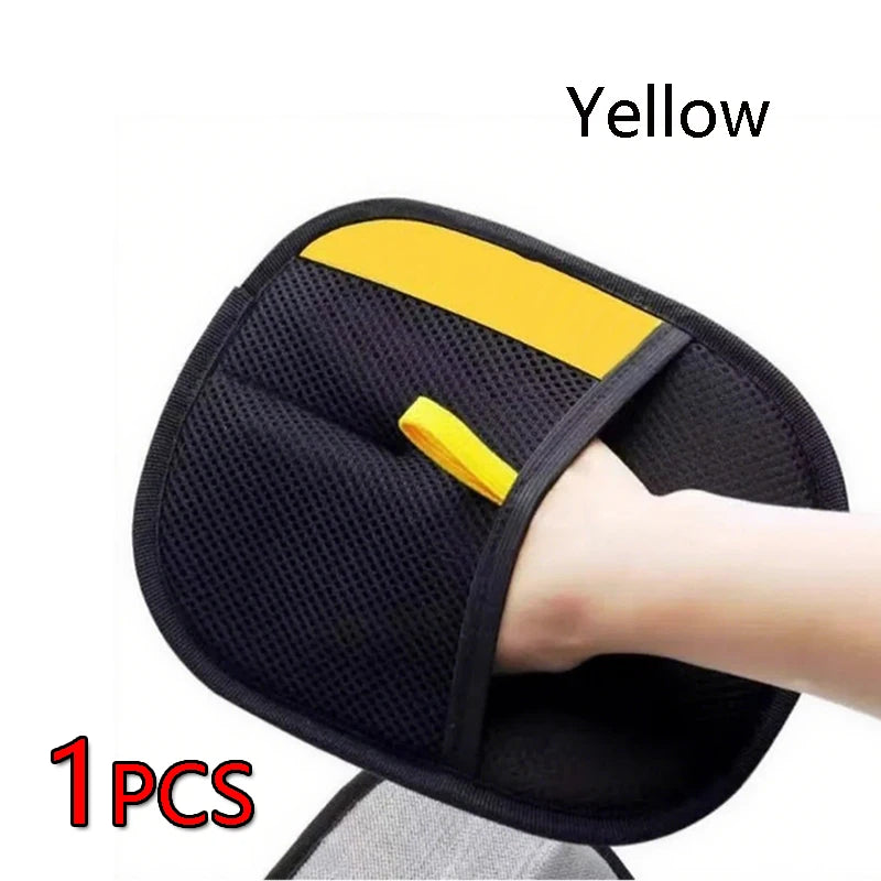 Black pet grooming gloves with a yellow accent for hair removal and cleaning