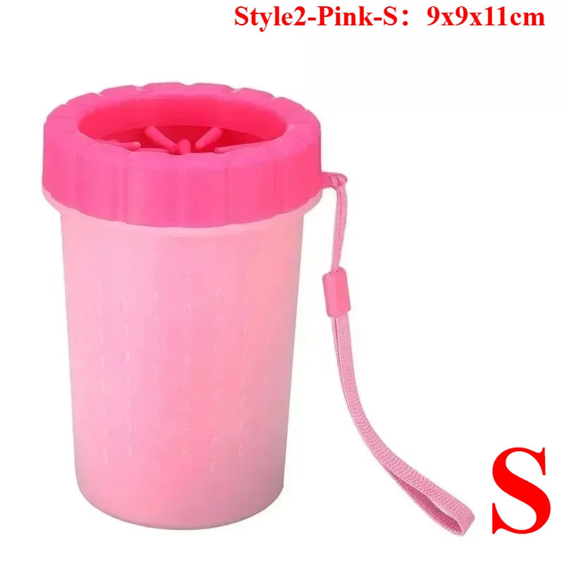 Pink portable paw washer cup with soft silicone bristles, measuring 9x9x11cm.