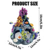 A dark, textured resin coral reef aquarium decor set featuring various colorful fish and marine life ornaments.