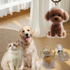 A transparent pet hair storage keychain featuring a small, fluffy dog and a cat.