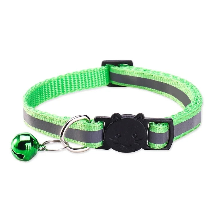 A green and gray safety breakaway cat collar with a black cat charm and a green bell.