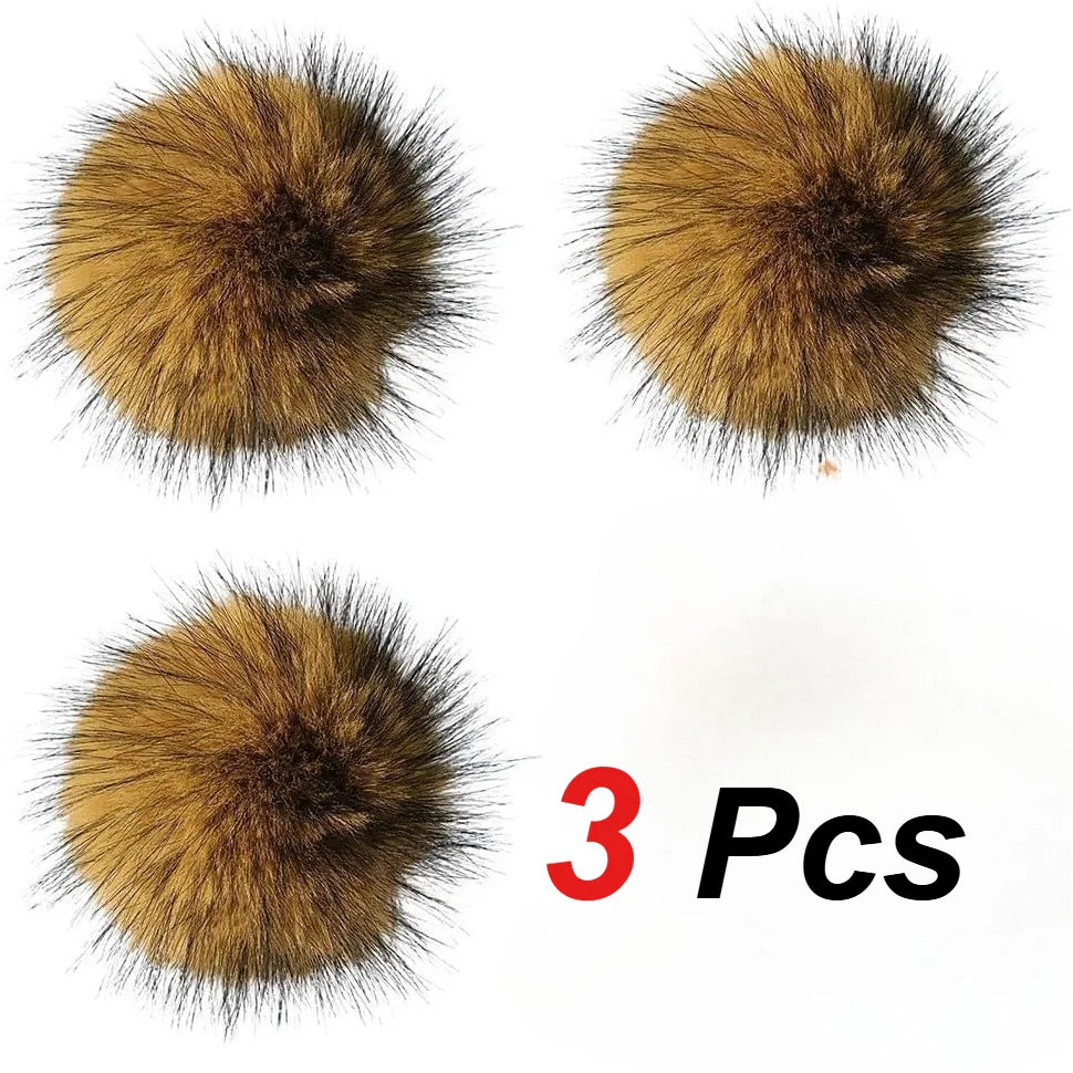 Three spherical imitation rabbit fur cat toys or balls with golden brown fluffy texture.