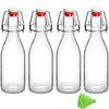 Quatre bouteilles à couvercle en verre clair avec des bouchons verts, vues sous différents angles