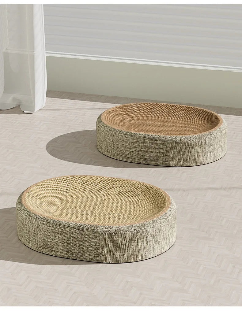 Oval sisal cat scratching board with a resting nest made of woven natural fiber.