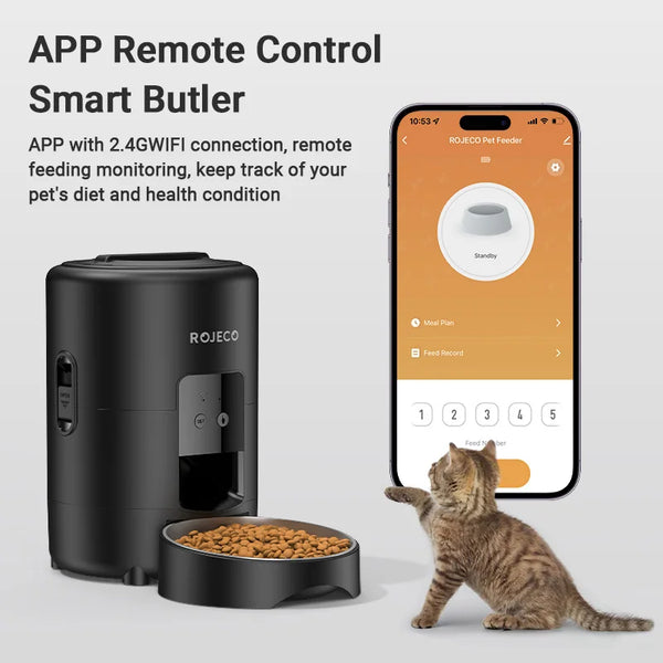 A black smart pet feeder device next to a smartphone screen showing an app interface for remote feeding monitoring.